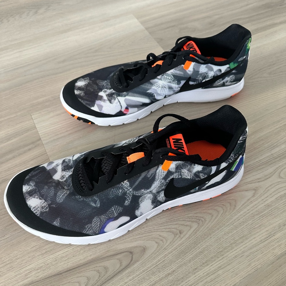 Nike Black and White Running Shoes with Orange Highlights